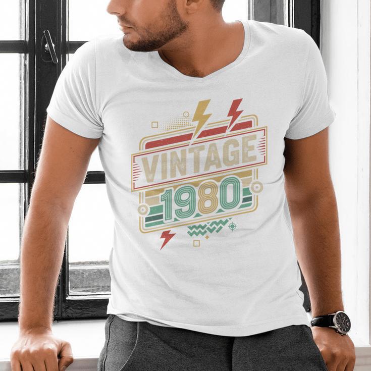 Vintage 1980 Retro Badge Decade Nostalgia Graphic Emblem Premium Tri-Blend Men's V-Neck T-Shirt