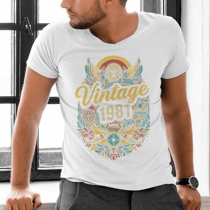 Vintage 1981 Retro Badge Nostalgia Eighties Compass Skull Premium Tri-Blend Men's V-Neck T-Shirt