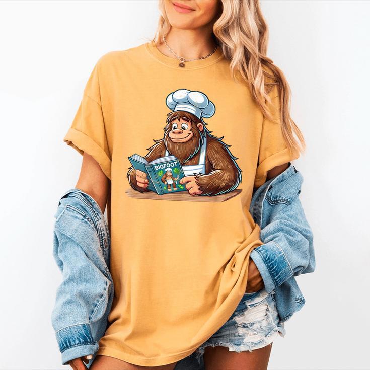 Bigfoot Reading a Cookbook Women's Comfort Colors T-Shirt Bigfoot Reading a Cookbook Women's Comfort Colors T-Shirt