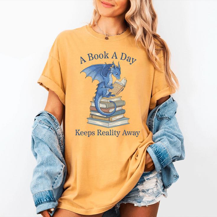 A Book A Day Keeps Reality Away Premium Tri-Blend Women's Comfort Colors T-Shirt