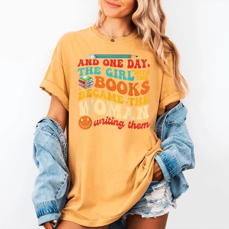 The Girl With The Books Became The Woman Writing Them Women's Comfort Colors T-Shirt The Girl With The Books Became The Woman Writing Them Women's Comfort Colors T-Shirt