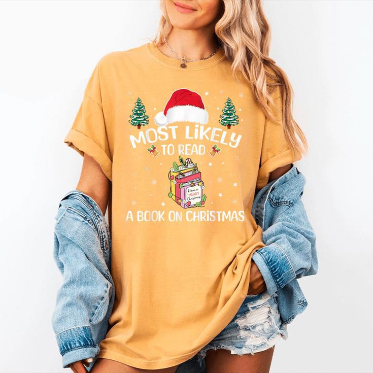 Most Likely To Read A Book On Christmas Love Reading Books Women's Comfort Colors T-Shirt