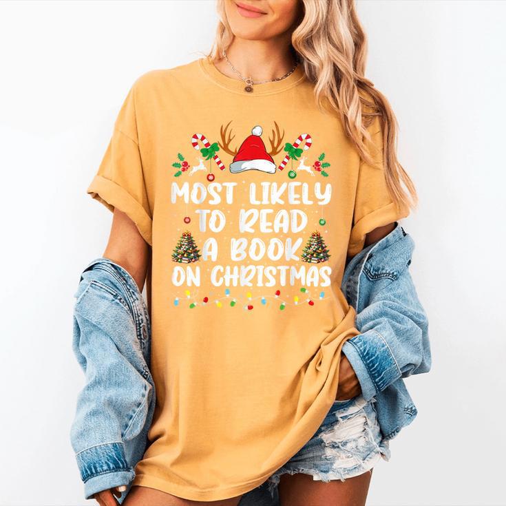 Most Likely To Read A Book On Christmas Matching Family Women's Comfort Colors T-Shirt Most Likely To Read A Book On Christmas Matching Family Women's Comfort Colors T-Shirt