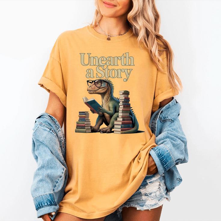 Unearth A Story Dinosaur Reading a Library Book Women's Comfort Colors T-Shirt