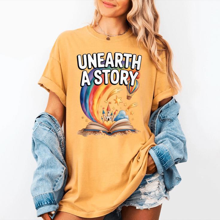 Unearth A Story Rainbow Treasure Book Women's Comfort Colors T-Shirt Unearth A Story Rainbow Treasure Book Women's Comfort Colors T-Shirt