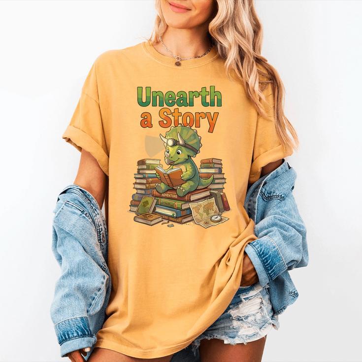 Unearth a Story Triceratops Dinosaur Reading Books Cute Dino Women's Comfort Colors T-Shirt