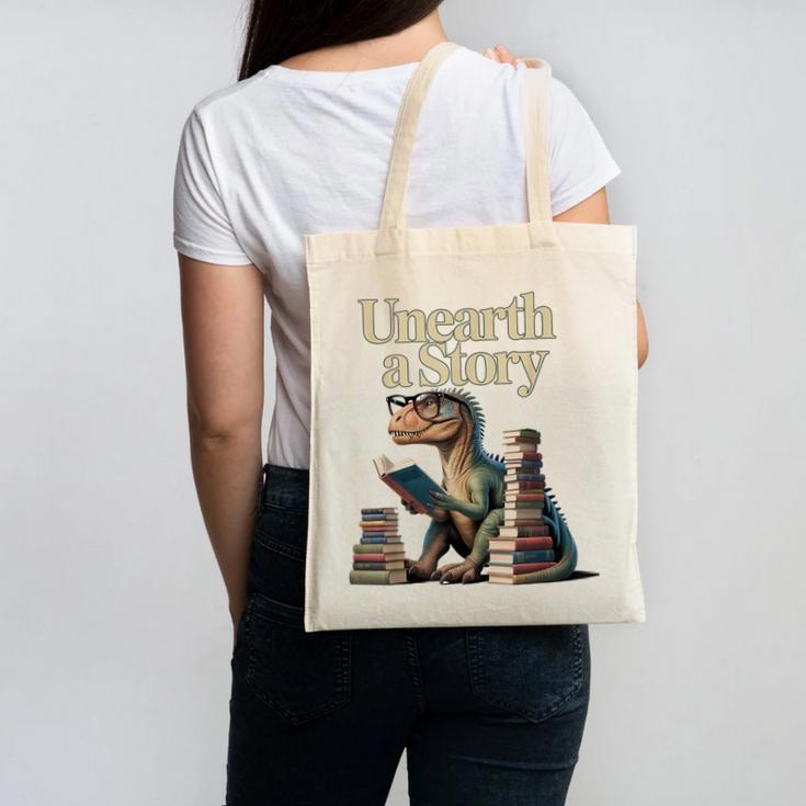 Unearth A Story Dinosaur Reading a Library Book Canvas Tote Bag