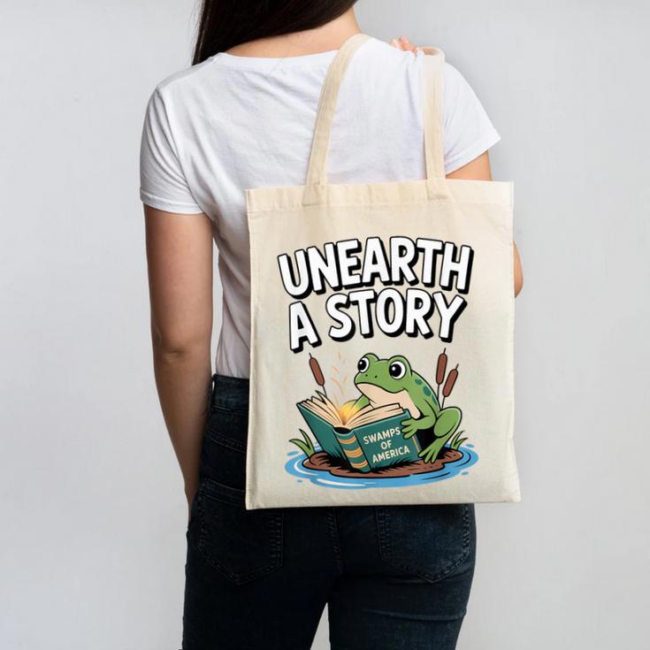 Unearth a Story Frog Reading a Book Summer 2026 Canvas Tote Bag