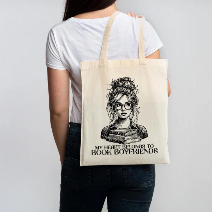 Book Lover Bent Over a Book Canvas Tote Bag