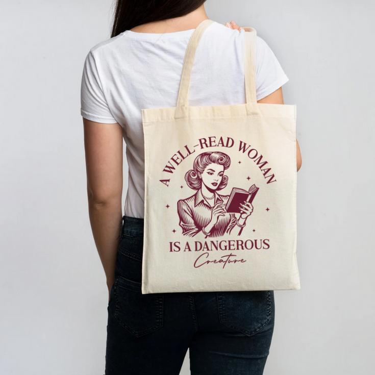 Books A Well-Read Woman Is A Dangerous Creature Women Premium Tri-Blend Canvas Tote Bag