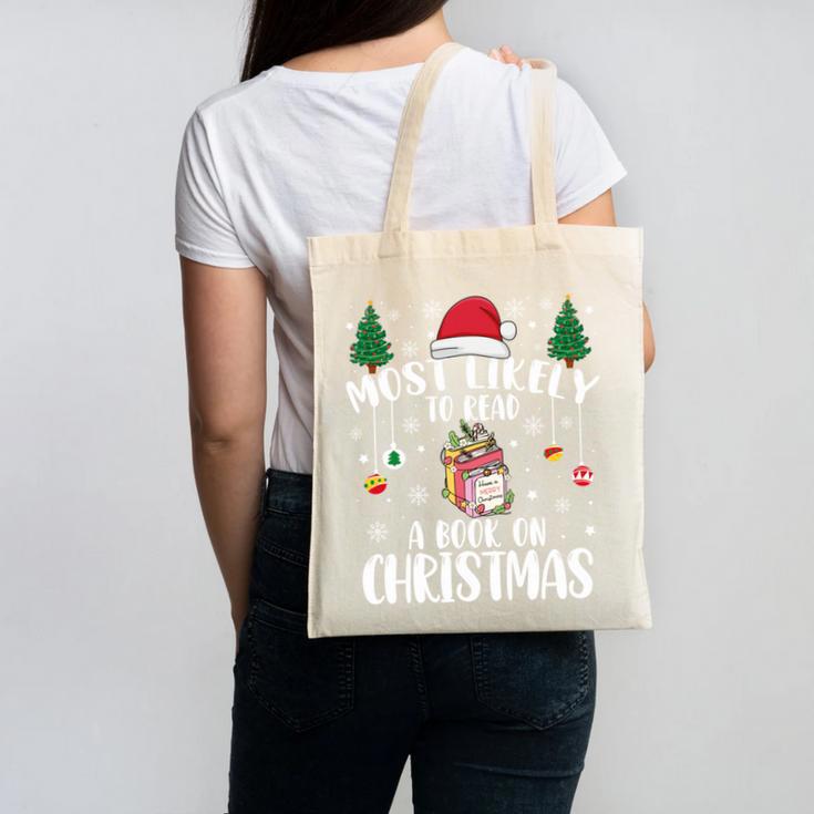 Christmas Tee Most Likely To Read A Book On Christmas Canvas Tote Bag
