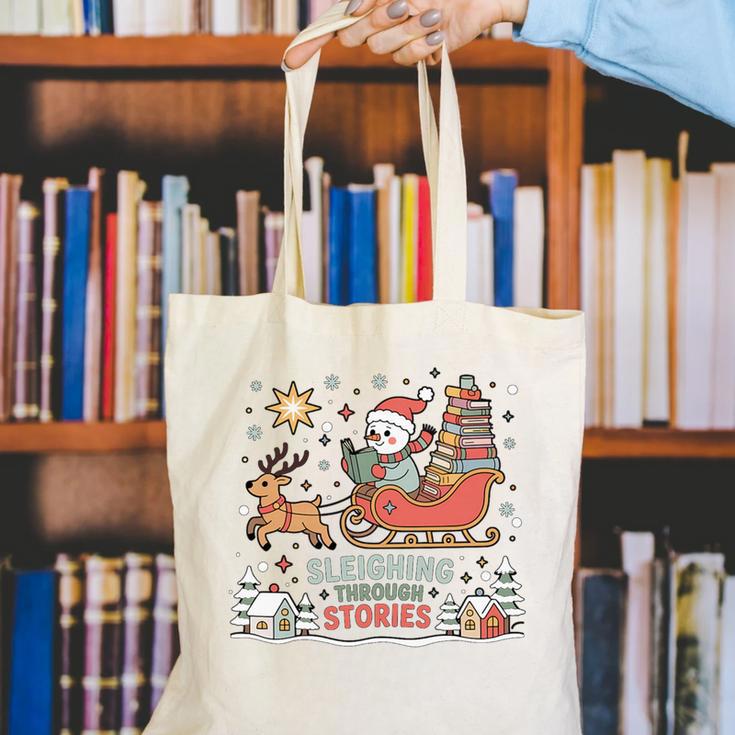 Book Lovers Winter Sleighing Through Stories Tee Premium Tri-Blend Canvas Tote Bag Book Lovers Winter Sleighing Through Stories Tee Premium Tri-Blend Canvas Tote Bag