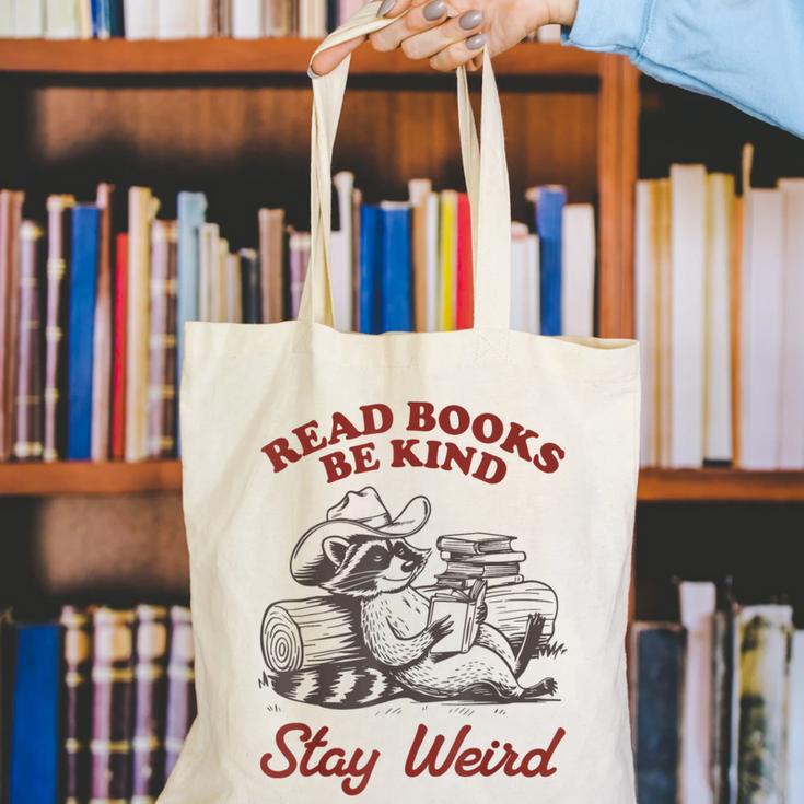 Read Books Be Kind Stay Weird Bookish Cowboy Reading Raccoon Canvas Tote Bag
