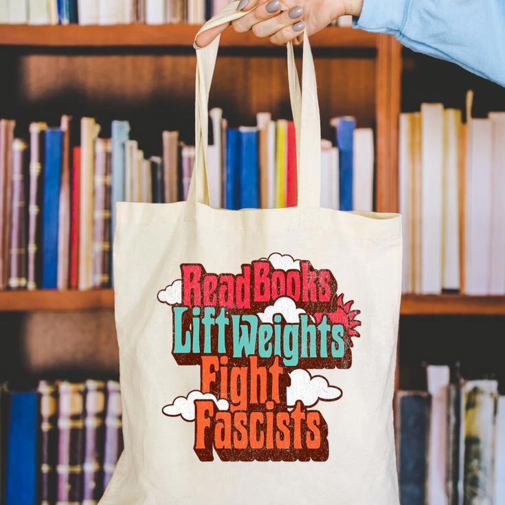 Read Books Lift Weights Fight Fascists Reading No Kings Premium Tri-Blend Canvas Tote Bag Read Books Lift Weights Fight Fascists Reading No Kings Premium Tri-Blend Canvas Tote Bag