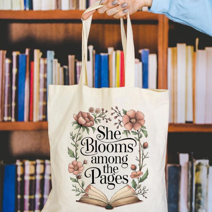 She Blooms Among The Pages Women Mom Wife Floral Book Lover Premium Tri-Blend Canvas Tote Bag She Blooms Among The Pages Women Mom Wife Floral Book Lover Premium Tri-Blend Canvas Tote Bag