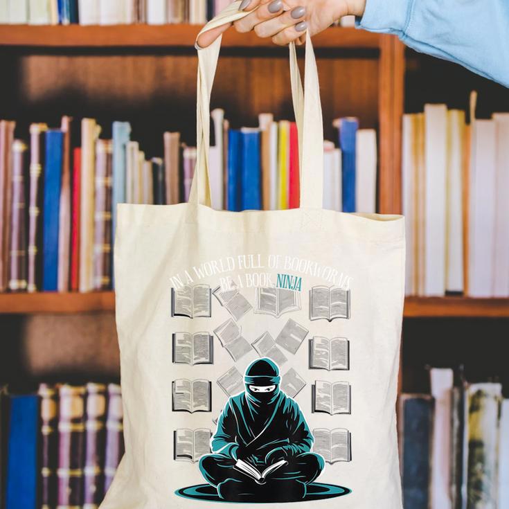 In A World Full Of Bookworms Be A Book Ninja Reading Reader Canvas Tote Bag