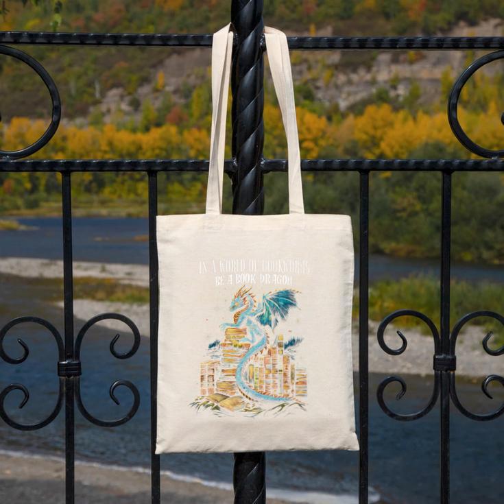 Bookish Quote In a World Of Bookworms Be a Book Dragon Canvas Tote Bag Bookish Quote In a World Of Bookworms Be a Book Dragon Canvas Tote Bag