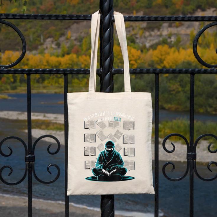 In A World Full Of Bookworms Be A Book Ninja Reading Reader Canvas Tote Bag