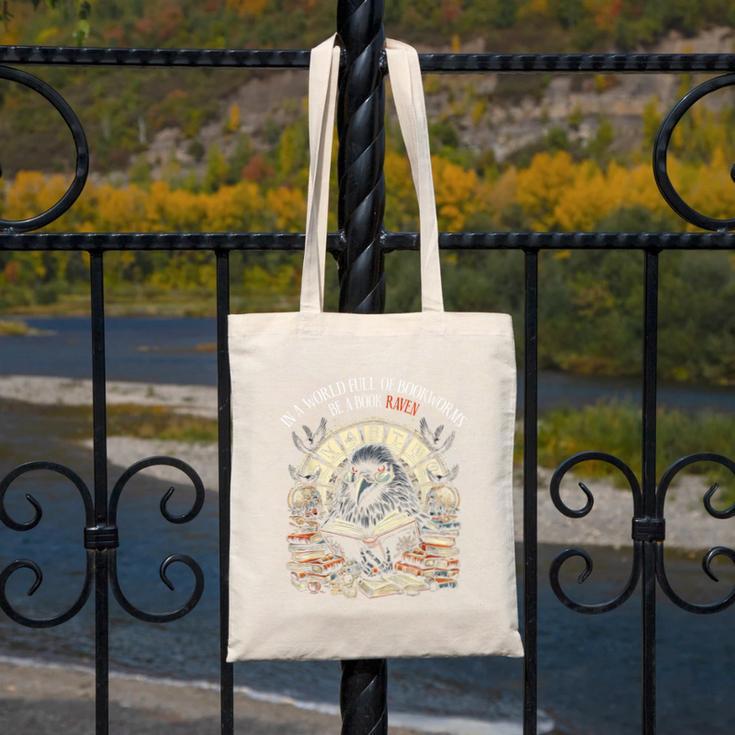 In A World Full Of Bookworms Be A Book Raven Reader Reading Canvas Tote Bag