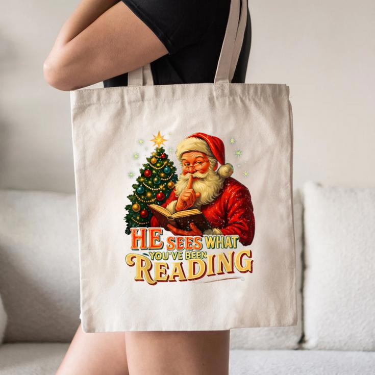 He Sees What You’Ve Been Reading Santa Book Lover Christmas Canvas Tote Bag