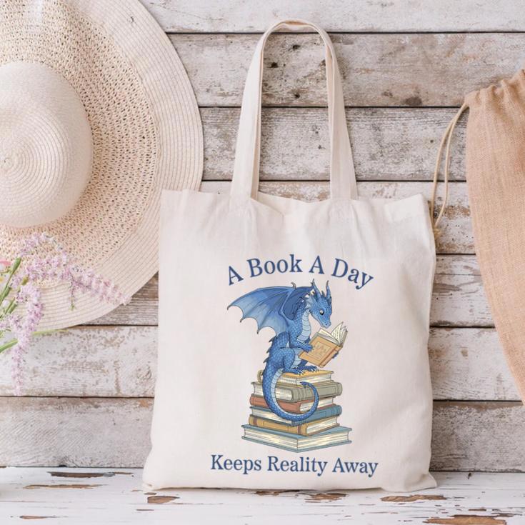 A Book A Day Keeps Reality Away Premium Tri-Blend Canvas Tote Bag A Book A Day Keeps Reality Away Premium Tri-Blend Canvas Tote Bag