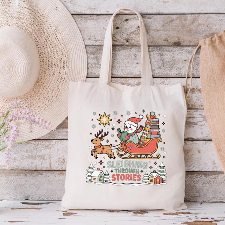 Book Lovers Winter Sleighing Through Stories Tee Premium Tri-Blend Canvas Tote Bag Book Lovers Winter Sleighing Through Stories Tee Premium Tri-Blend Canvas Tote Bag