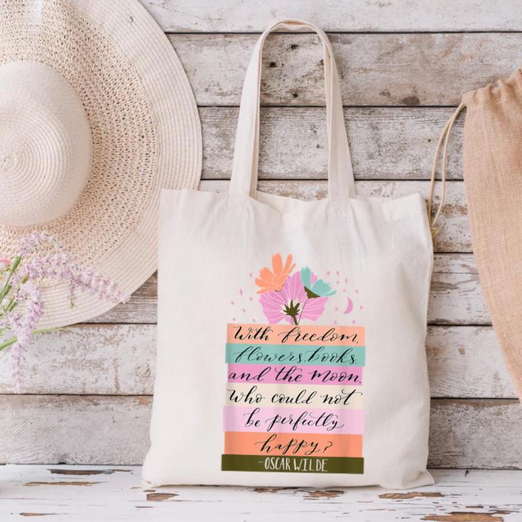 With Freedom Flowers Books And The Moon Canvas Tote Bag