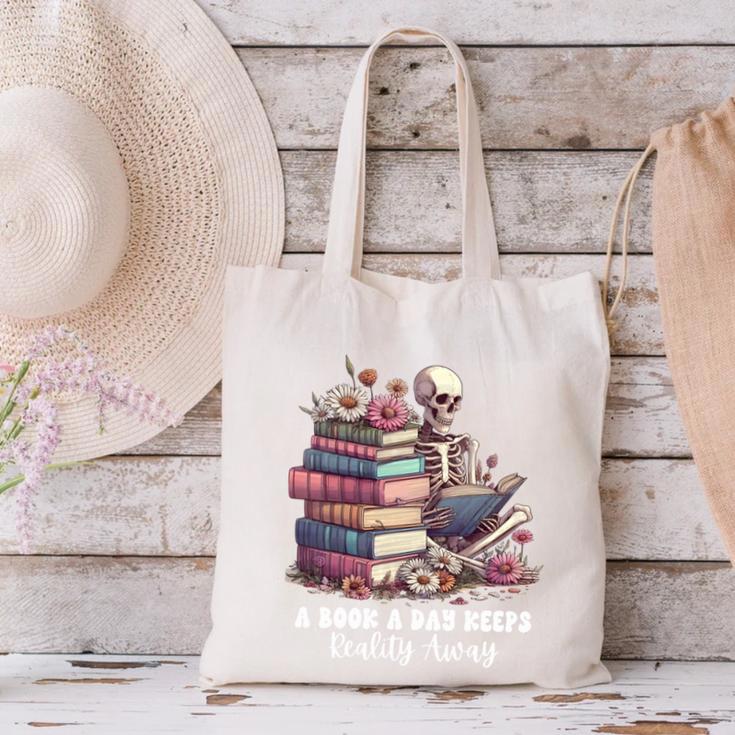 Reading A Book Per Day Keeps Reality Away Skeleton Books Canvas Tote Bag