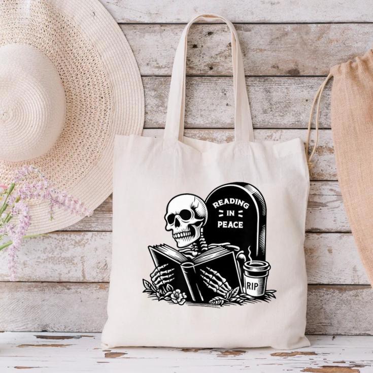 READING IN PEACE RIP Introvert Skeleton Read Book Meme Canvas Tote Bag READING IN PEACE RIP Introvert Skeleton Read Book Meme Canvas Tote Bag