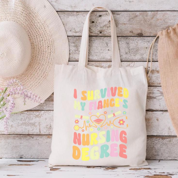 i Survived My Fiance's Nursing Degree Graduation Groovy Premium Canvas Tote Bag
