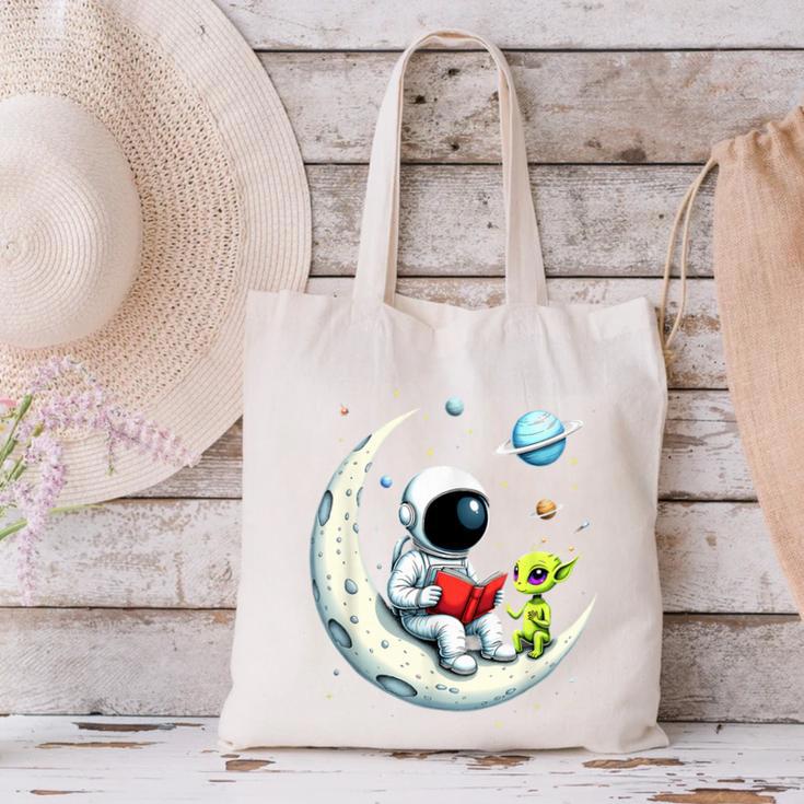 UFO Alien Astronaut Reading Book In Space Canvas Tote Bag UFO Alien Astronaut Reading Book In Space Canvas Tote Bag