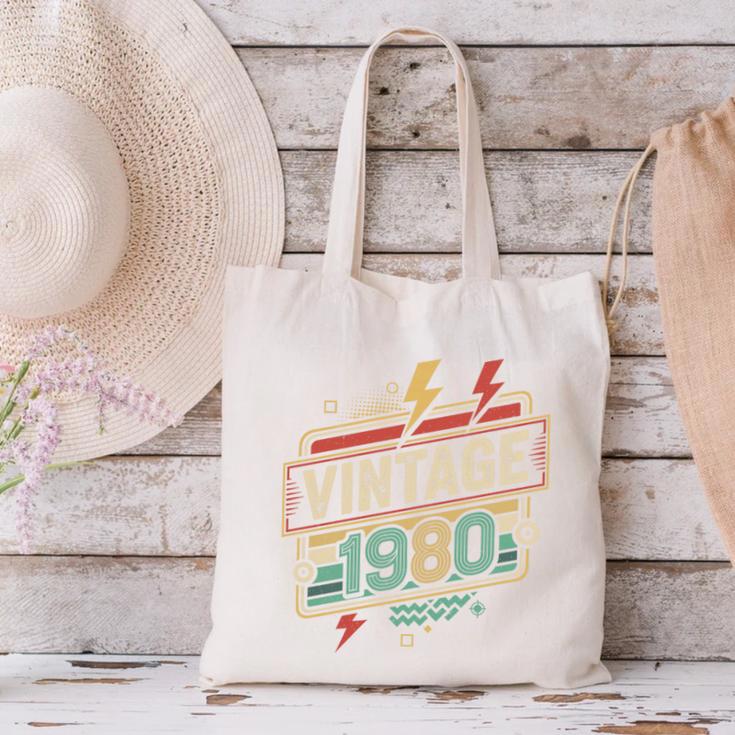 Vintage 1980 Retro Badge Decade Nostalgia Graphic Emblem Premium Tri-Blend Canvas Tote Bag