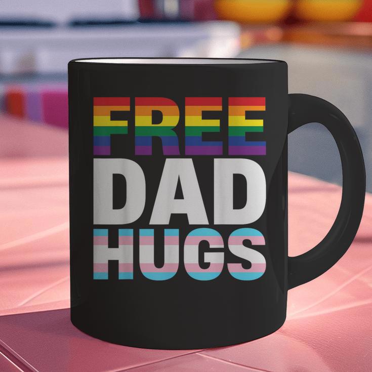 Free Dad Hugs Pride Flag Month LGBTQ Transgender Support Graphic Print Coffee Mug Free Dad Hugs Pride Flag Month LGBTQ Transgender Support Graphic Print Coffee Mug