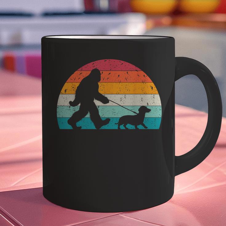 Retro Sasquatch Lover Doxie Wiener Dog Walker Bigfoot Walking a Dog Dachshund Weiner Dog Dad Weenie Small Graphic Print Coffee Mug