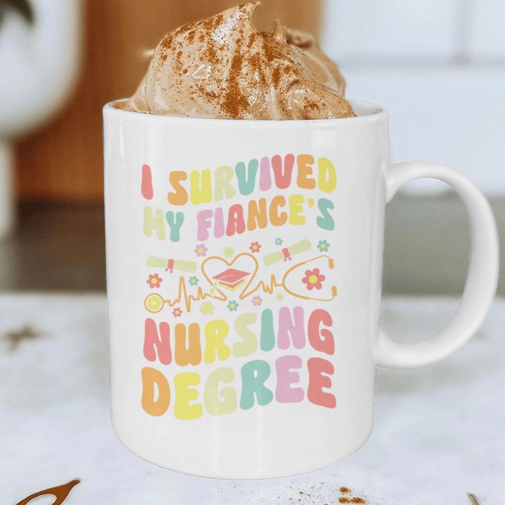 i Survived My Fiance's Nursing Degree Graduation Groovy Premium Graphic Print Coffee Mug
