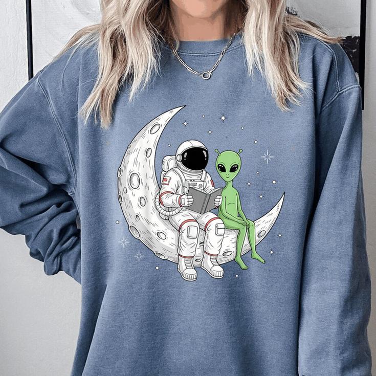 Astronaut Reading Book To Alien Moon Space Book Lover Men Comfort Colors Sweatshirt