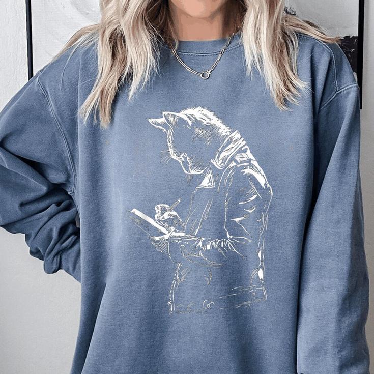 Cat Holds Book Writing Animal Print Motif Drawing Art Cat Comfort Colors Sweatshirt Cat Holds Book Writing Animal Print Motif Drawing Art Cat Comfort Colors Sweatshirt