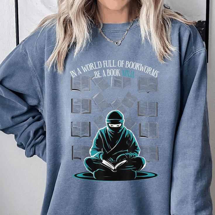 In A World Full Of Bookworms Be A Book Ninja Reading Reader Comfort Colors Sweatshirt