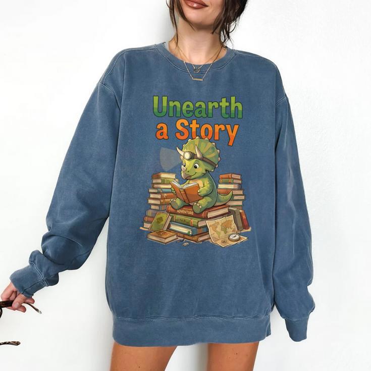 Unearth a Story Triceratops Dinosaur Reading Books Cute Dino Comfort Colors Sweatshirt