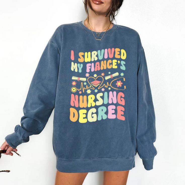 i Survived My Fiance's Nursing Degree Graduation Groovy Premium Comfort Colors Sweatshirt