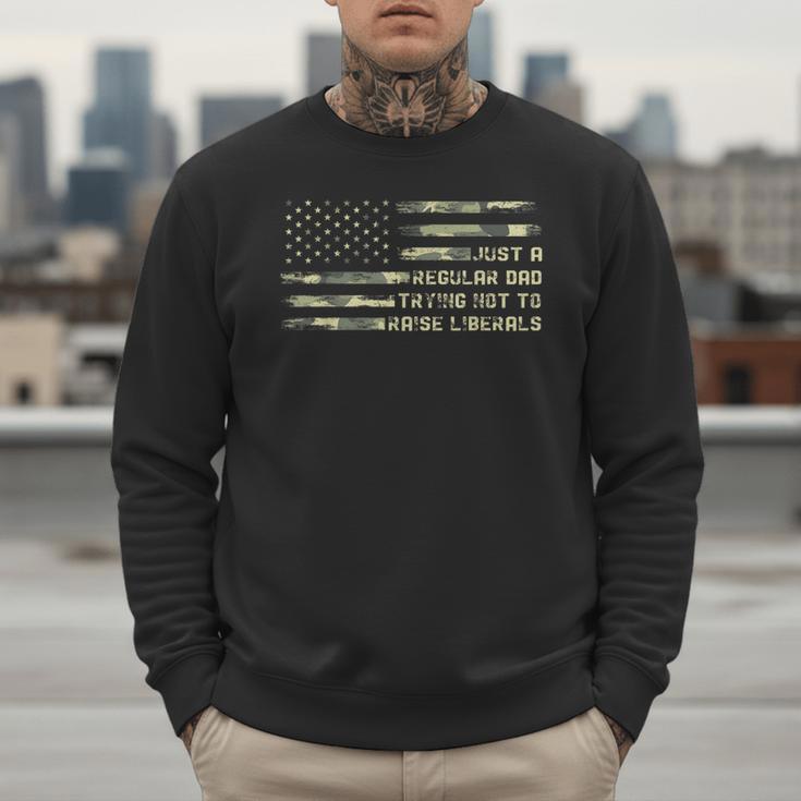 Just a Regular Dad Trying Not To Raise Liberals Camouflage Men Sweatshirt Just a Regular Dad Trying Not To Raise Liberals Camouflage Men Sweatshirt