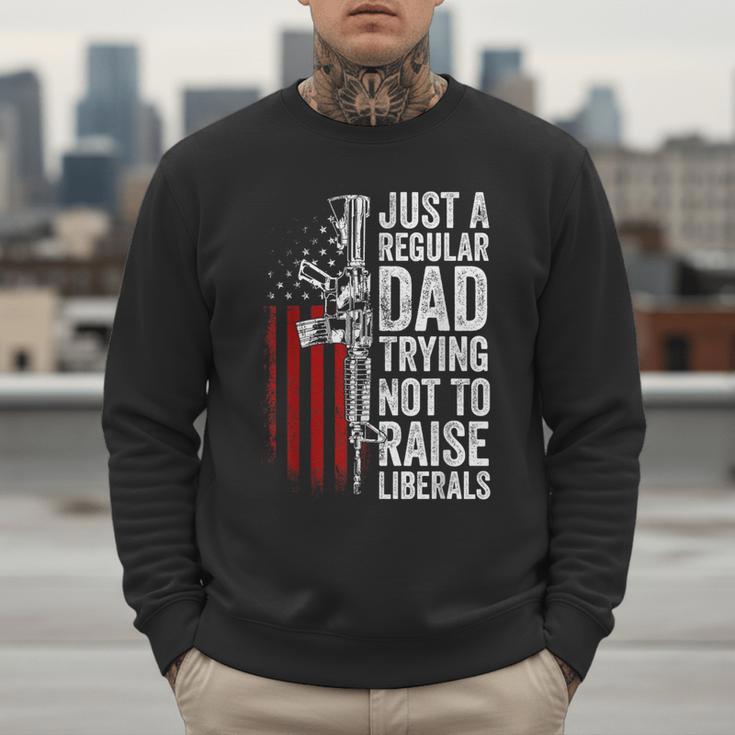 Just A Regular Dad Trying Not To Raise Liberals Father's Day Men Sweatshirt