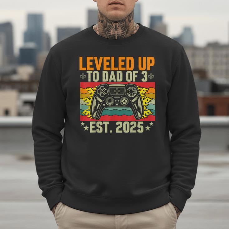 Leveled Up To Dad Of 3 Three Daddy Again 2025 Father's Day Men Sweatshirt Leveled Up To Dad Of 3 Three Daddy Again 2025 Father's Day Men Sweatshirt