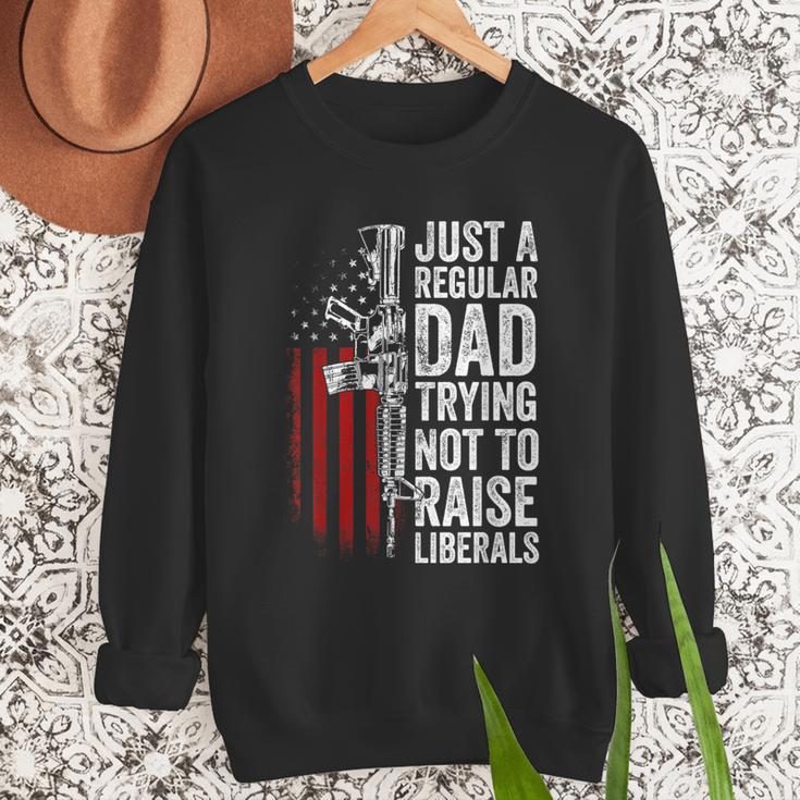 Just A Regular Dad Trying Not To Raise Liberals Father's Day Men Sweatshirt