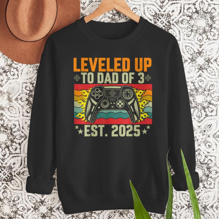 Leveled Up To Dad Of 3 Three Daddy Again 2025 Father's Day Men Sweatshirt Leveled Up To Dad Of 3 Three Daddy Again 2025 Father's Day Men Sweatshirt