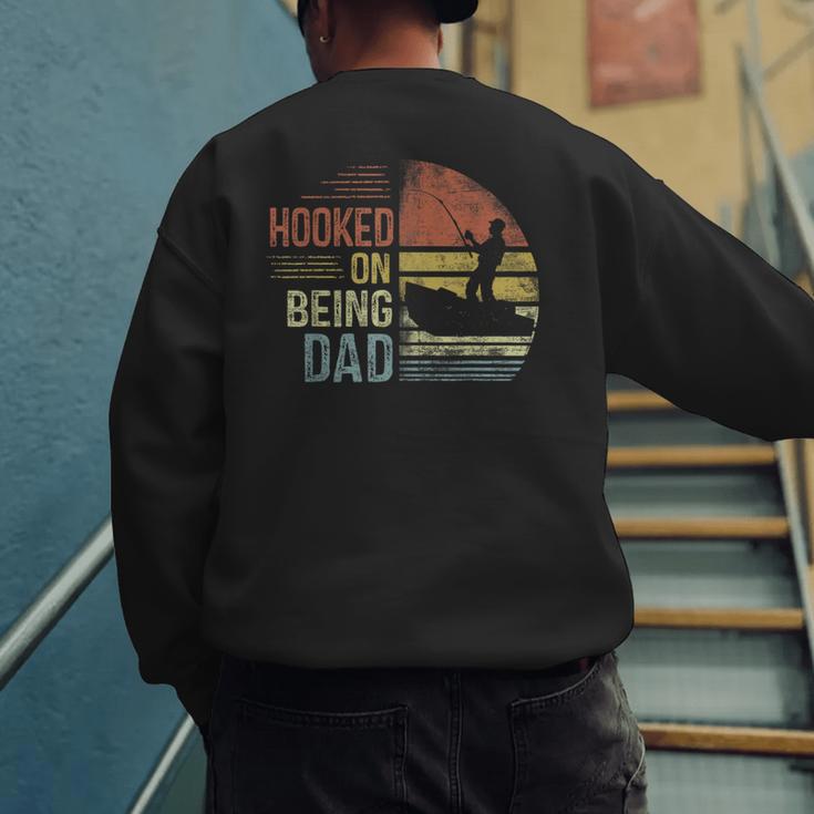 Hooked On Being Dad Fishing Dad Father's Day Men's Sweatshirt Back Print