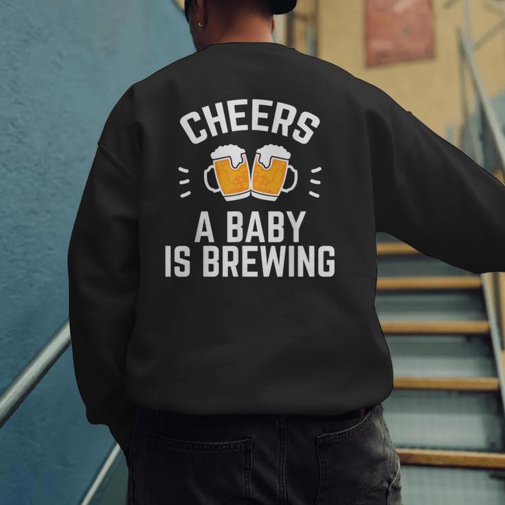 New Dad Baby Shower Cheers A Baby Is Brewing Men's Sweatshirt Back Print