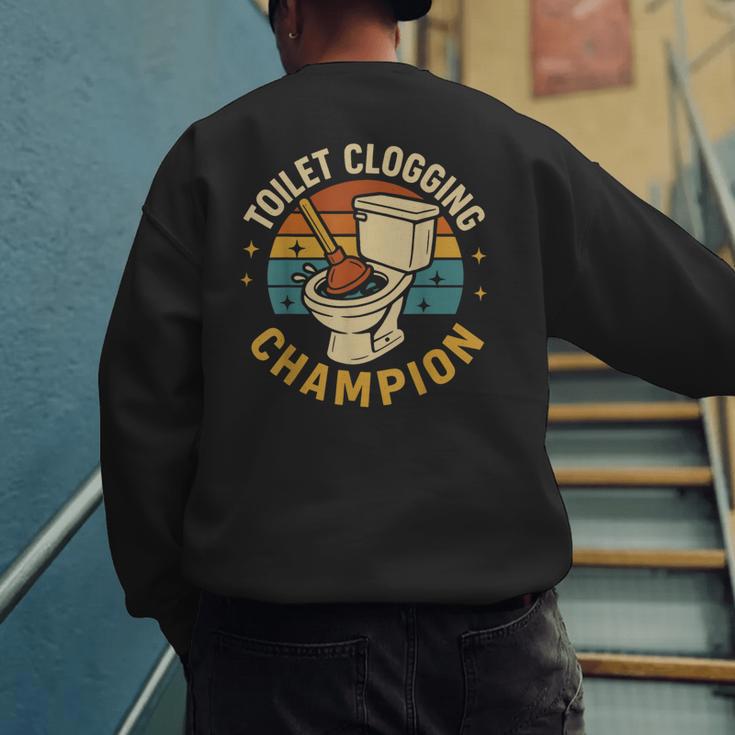 Toilet Clogging Champion Bathroom Humor Dad Jokes Men's Sweatshirt Back Print
