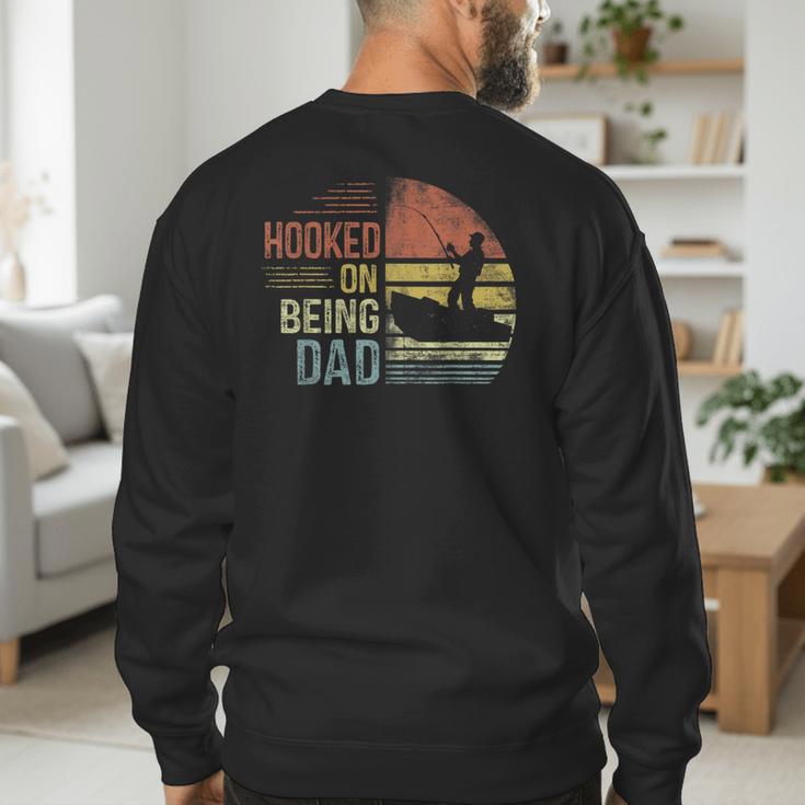 Hooked On Being Dad Fishing Dad Father's Day Men's Sweatshirt Back Print