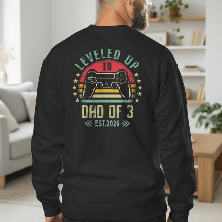 I Leveled Up To Dad Of 3 2026 Promoted To Dad Of Three Kids Men's Sweatshirt Back Print